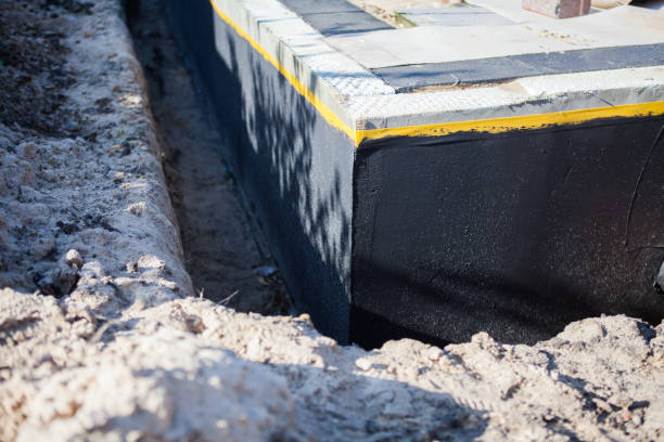 Professional Wet Basement Repair technician working in Rossville, IN